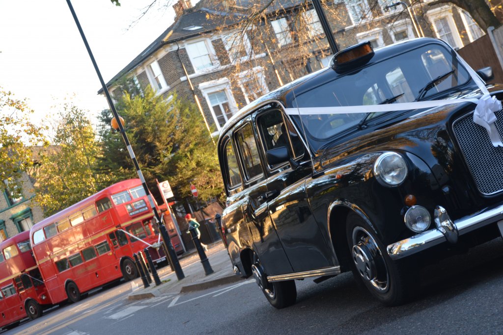 Black Fairway taxi with Routemaster bus 