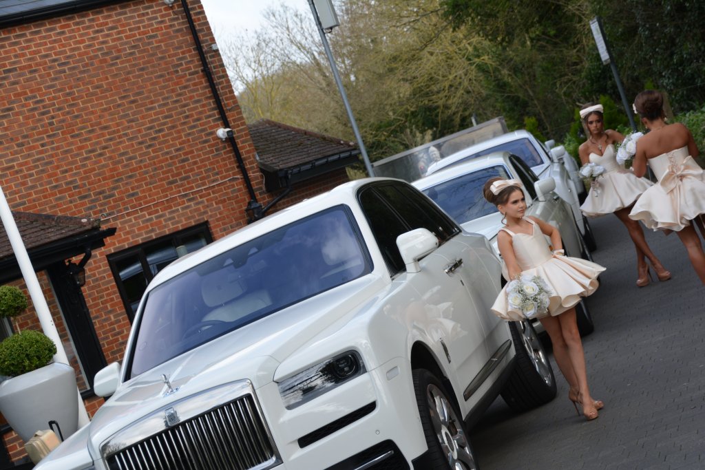 White Rolls Royce Jeep