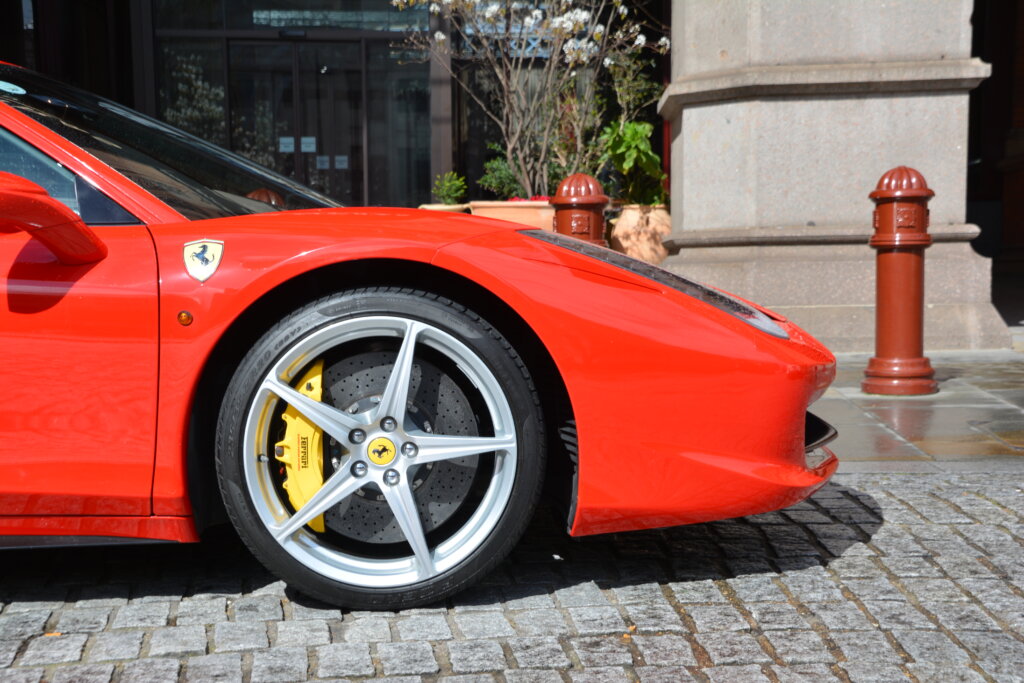 Red Ferrari hire London - side view
