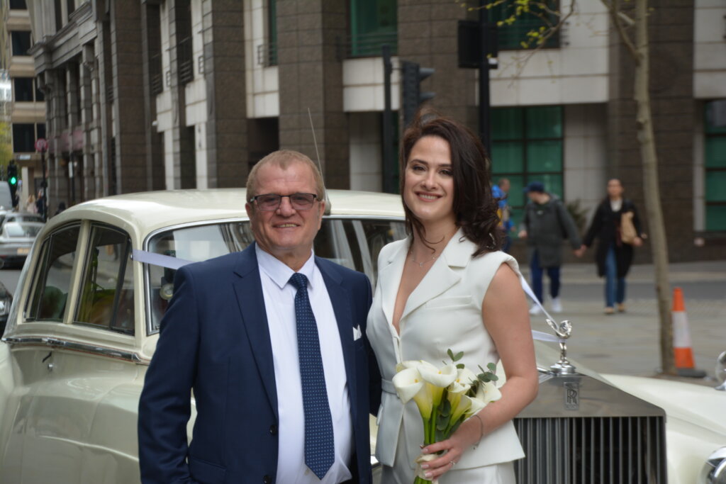 Bride and father in London Rolls royce silver cloud